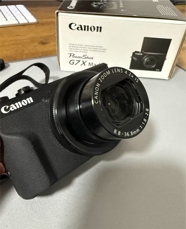 Brand new Canon powershot G7x Mark III with accessories.